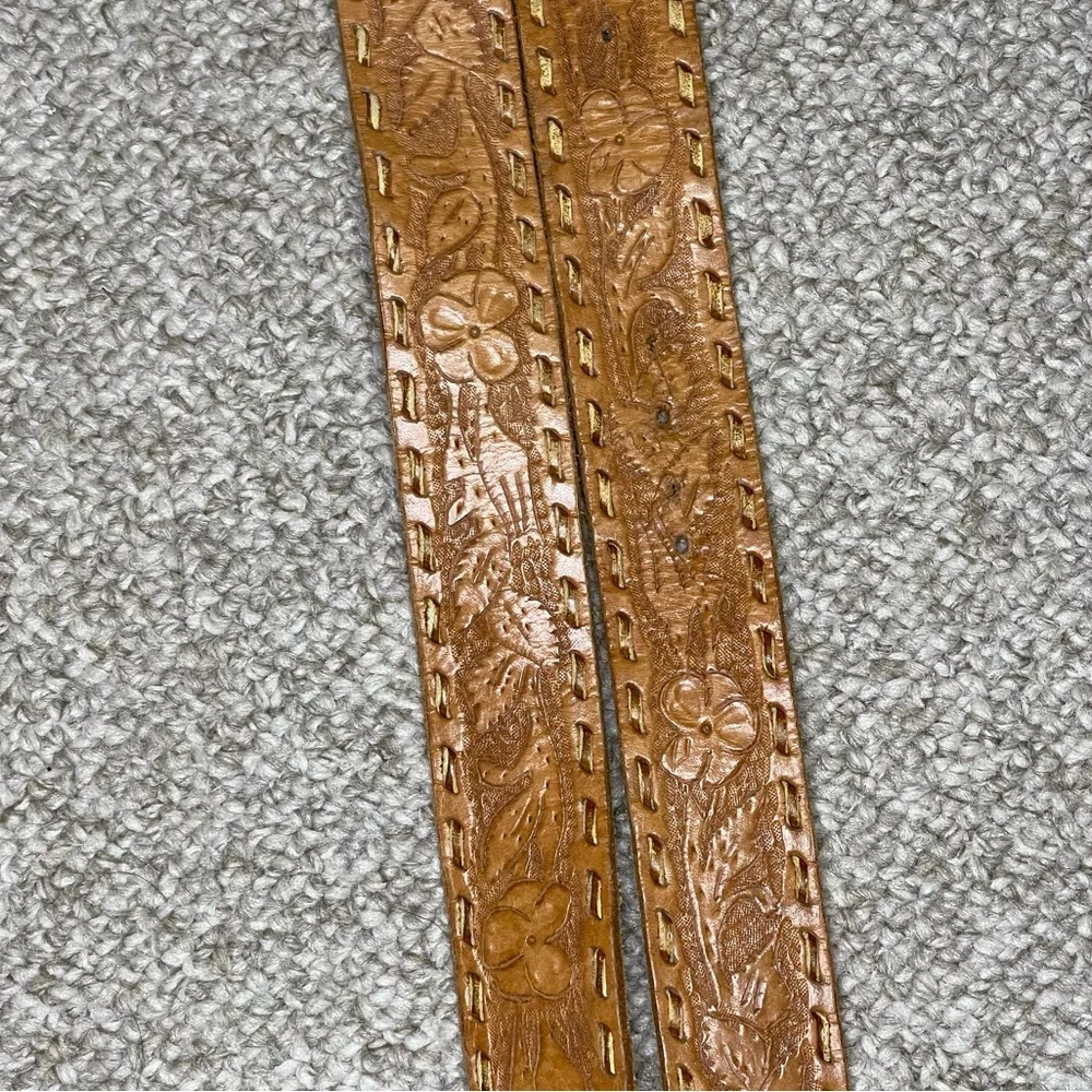 Cowboy belt buckle and leather belt